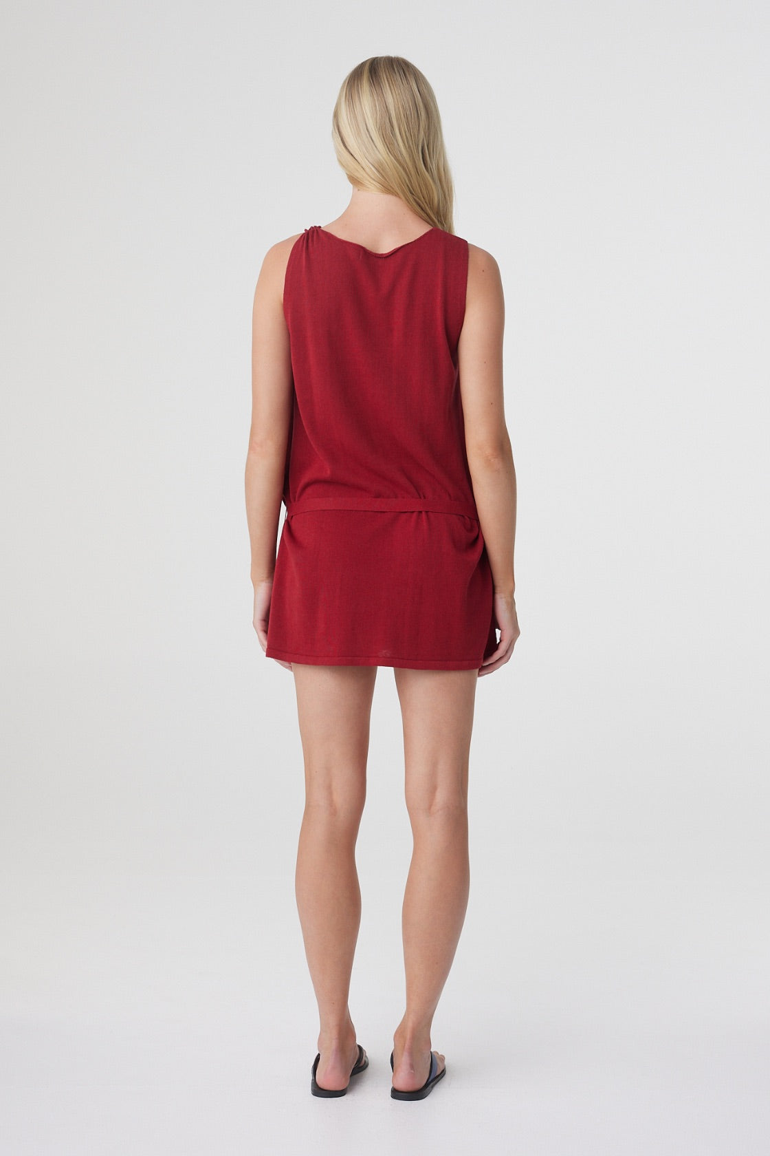 Clara Mini Dress in Chilli, back view showing the relaxed fit and sleeveless shape.