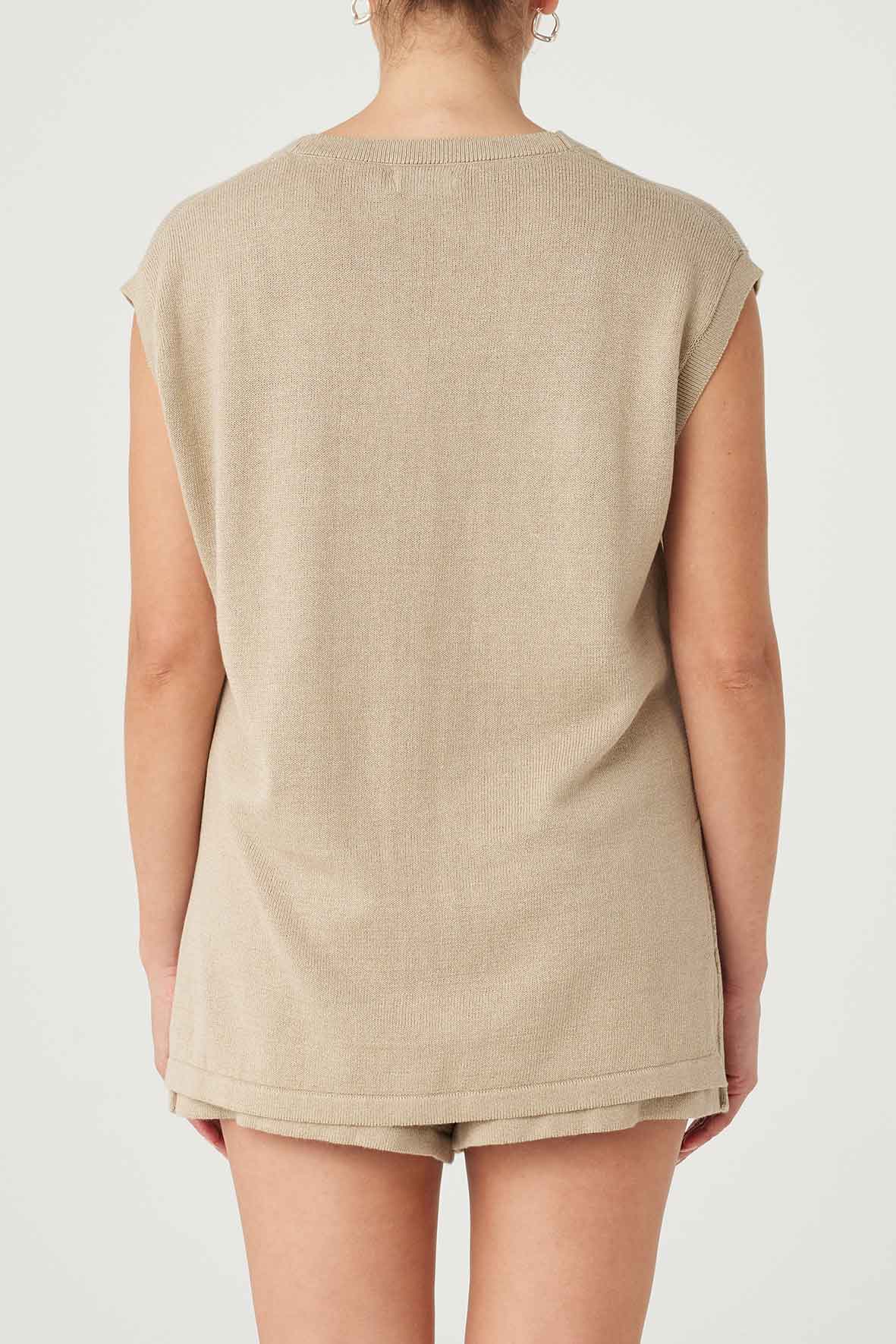 Back view of Ada Vest in taupe, ethically produced with lightweight linen-cotton blend and free from harmful chemicals.