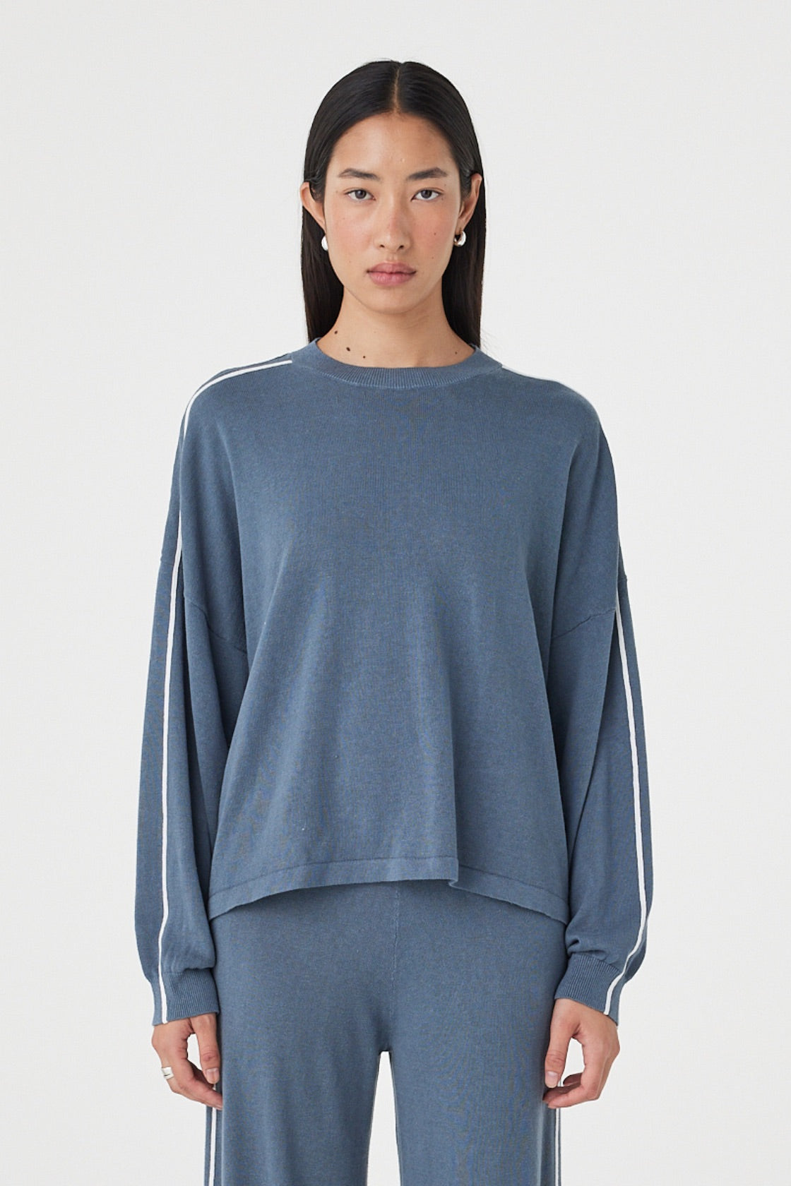 Front view of the Pippa Longsleeve Tee in Storm & Cream featuring an oversized silhouette, contrast stripe detailing and lightweight knit fabrication, styled with the matching Pippa Pant 2.0.