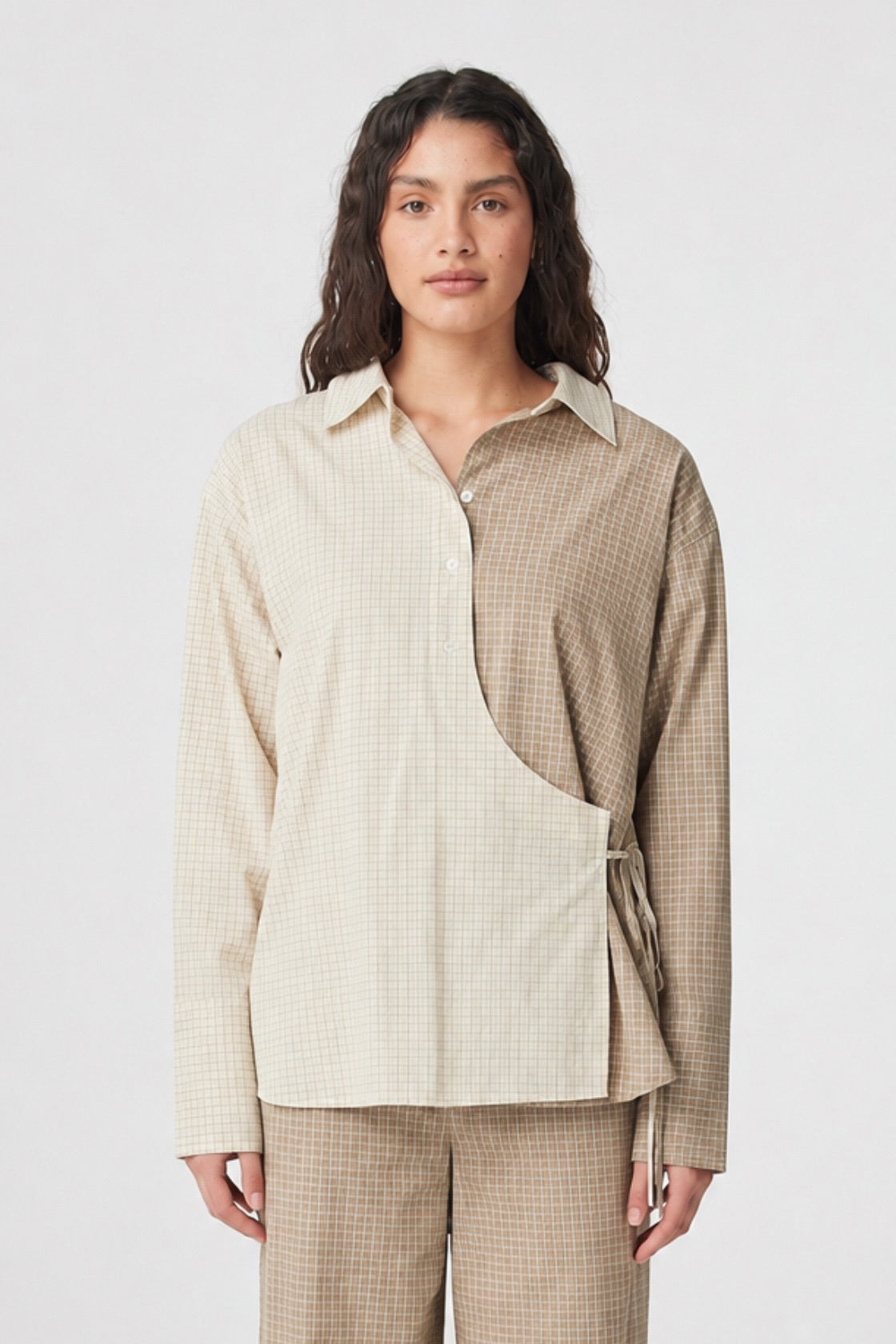 Autumn Wrap Shirt in Two Tone Check close front view showing the contrasting check panels, collared neckline and crossover tie detail.