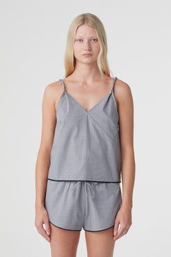 Allie Top in Muted Blue Check, close front view highlighting the deep V neckline, fine twisted straps and relaxed cotton silhouette.
