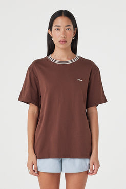 Kylen Tee in Espresso & Cream close front view showing the oversized cotton silhouette, contrast striped crew neckline and embroidered Arcaa logo at the chest.