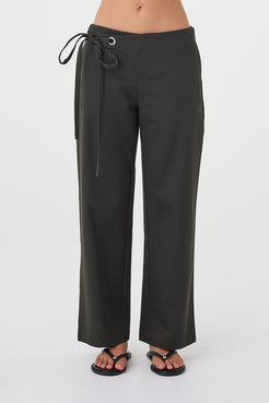 Close-up front view of the Lucia Tie Pant in Charcoal highlighting the silver eyelet detail, double ties and front overlap closure.
