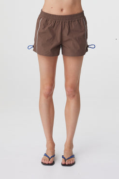 elasticated waistband, relaxed leg and adjustable side tie details.
