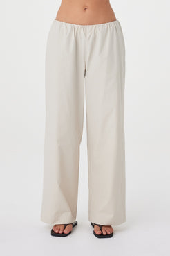 Close-up front view of the Annika Pant in Taupe highlighting the encased elastic waistband and soft texture.