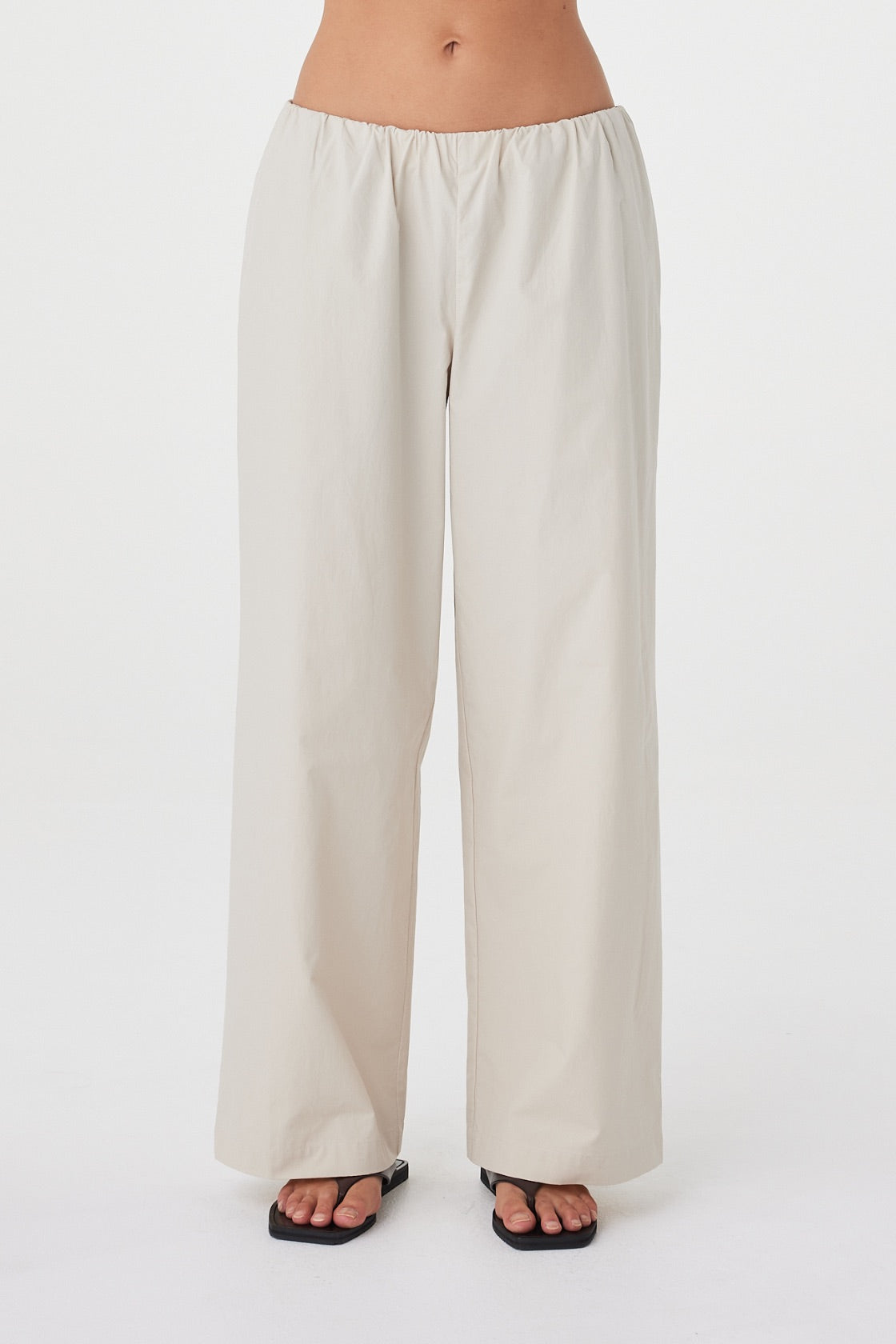 Close-up front view of the Annika Pant in Taupe highlighting the encased elastic waistband and soft texture.
