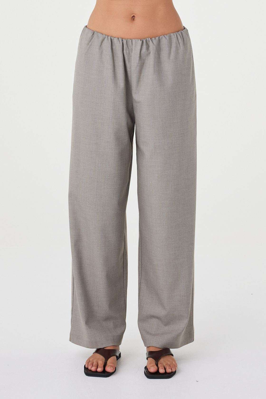 Front view of the Annika Pant in taupe blue pinstripe featuring the elasticated bubble waistband, relaxed straight wide-leg fit and soft tailored finish