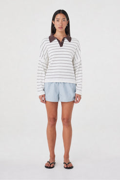 Front view of the Addie Short in Pale Blue featuring an elasticated waistband and adjustable side drawcord, styled with the Zia Tie Knit Jersey in Cream Stripe.