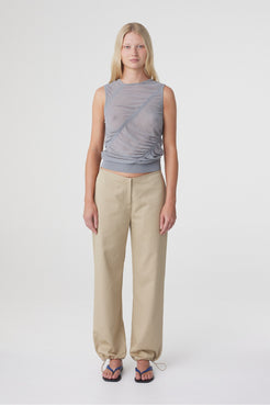 Sabi Pant in Taupe styled with a grey sleeveless top, full length front view showing the straight leg silhouette and gathered drawstring hems.