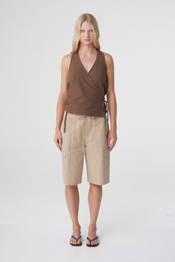 Daria Short in Camel, full front view styled with the Lilia Wrap Top in Espresso, showing the relaxed knee length silhouette.