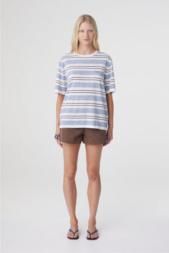 Addie Short in Espresso, full front view styled with an oversized striped tee, showing the relaxed mini length and gathered waistband.