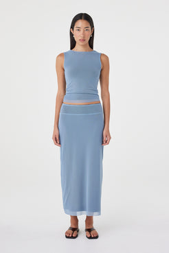 Front view of the Eden Reversible Skirt in Pale Blue & Espresso featuring the pale blue side, longline silhouette and wide waistband, styled with the matching Eden Reversible Top.