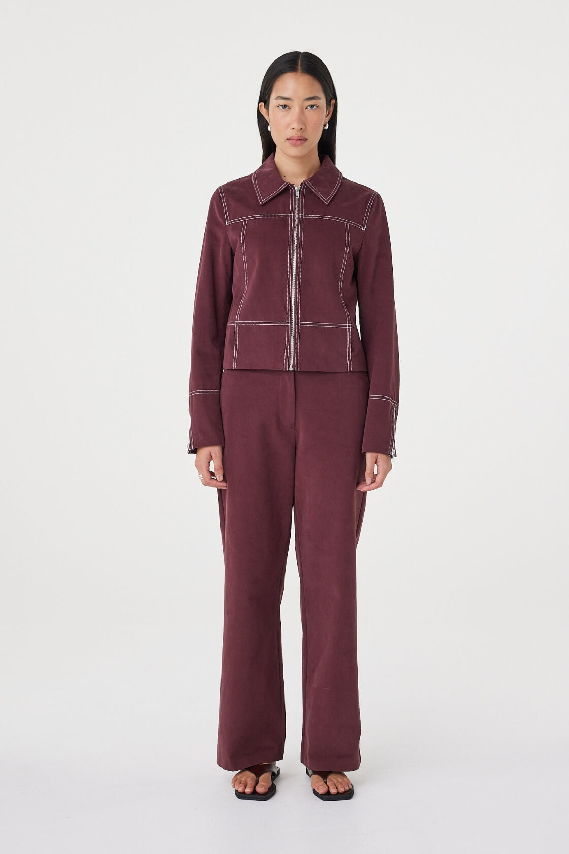 Front view of the Avery Pant in Merlot featuring a relaxed straight-leg silhouette, styled with the matching Benny Jacket in Merlot.