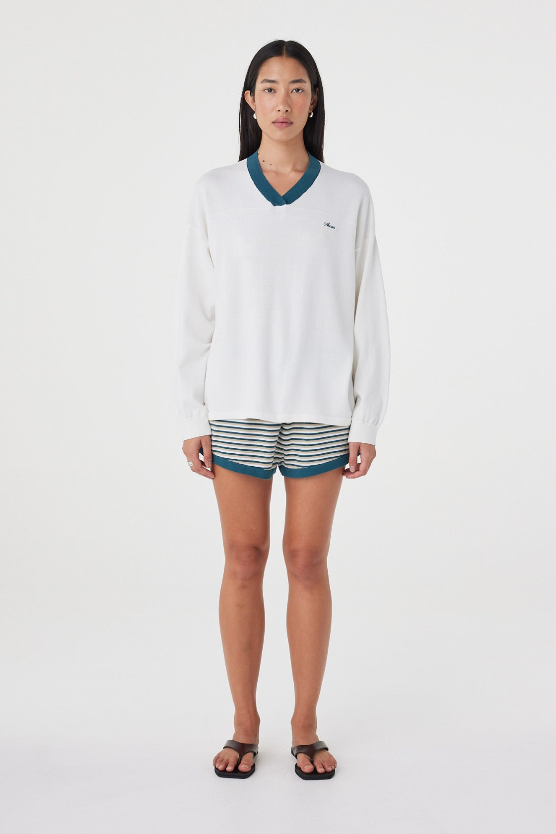 Front full-length view of the Netta Shorts in Teal Cream Stripe styled with the Cammy LS Tee in Cream & Teal for a coordinated set.