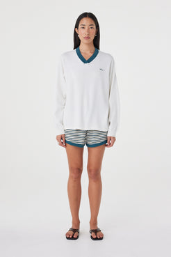Front full-length view of the Netta Shorts in Teal Cream Stripe styled with the Cammy LS Tee in Cream & Teal for a coordinated set.