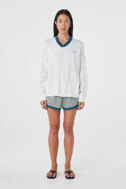 Full-length front view of the Cammy LS Tee in Cream & Teal highlighting the relaxed drape, lightweight organic cotton knit and oversized proportions.