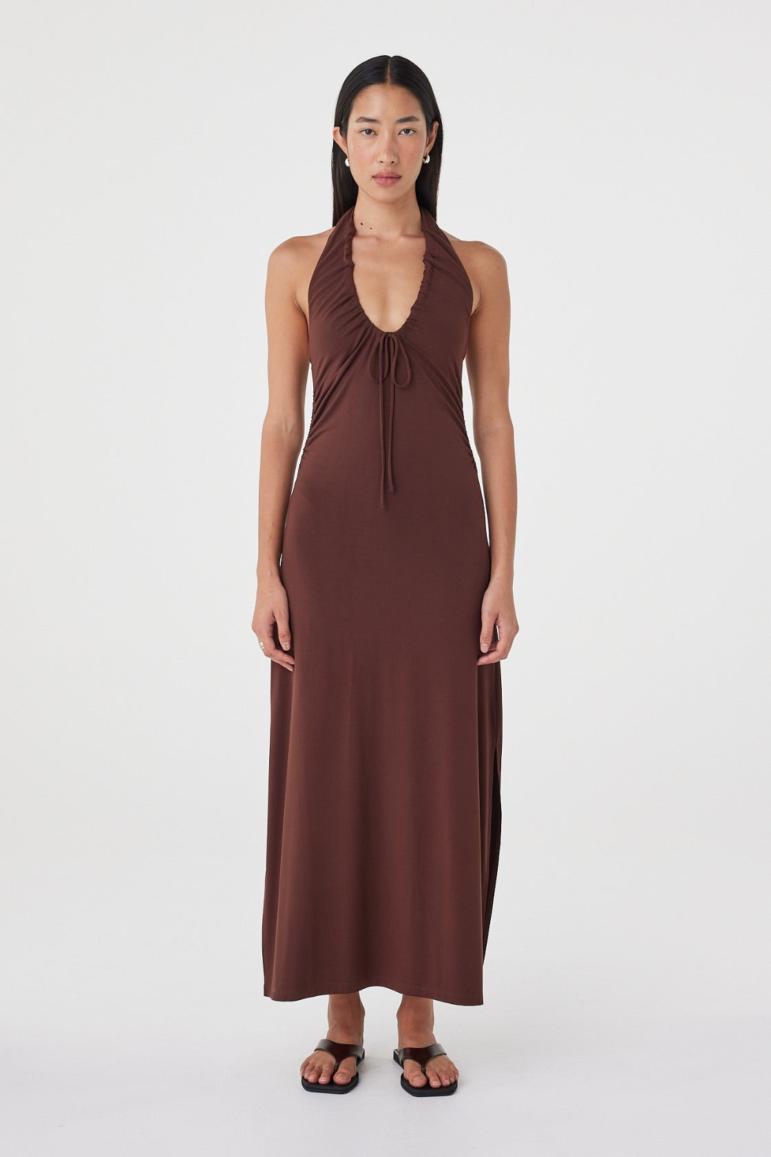 Front view of the Suki Dress in Espresso highlighting the plunging halter neckline, adjustable tie and gathered waist.