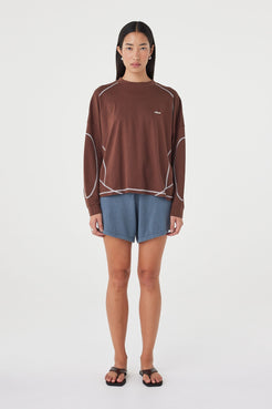 Front view of the Kesh LS Tee in Espresso & Cream highlighting the dropped shoulders, contrast overlocking and soft cotton fabrication.