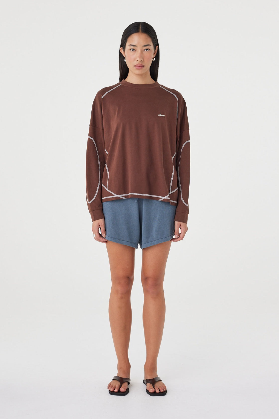 Front view of the Kesh LS Tee in Espresso & Cream highlighting the dropped shoulders, contrast overlocking and soft cotton fabrication.