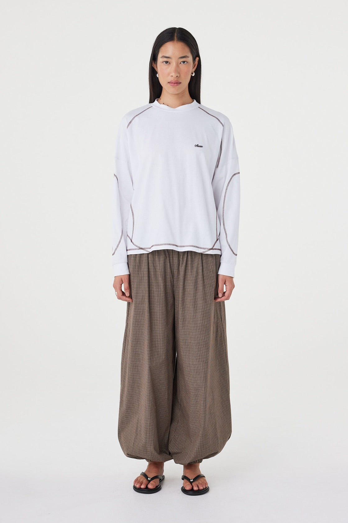 Front view of the Kesh LS Tee in Cream & Espresso highlighting the dropped shoulders, contrast overlocking and soft cotton fabrication.