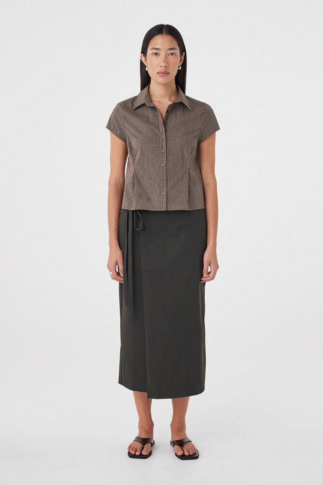 Front view of the Freya Shirt in Chocolate Check highlighting the collared neckline, button-front closure and structured princess seam construction.