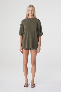 Pippa Oversized Tee in Smokey Olive and Dusk Blue, front view showing the loose fit through the body and wide short sleeves.

