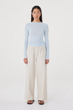 Aston LS Top in Pale Blue styled with the Annika Pants in Taupe, full-length front view showing the slim shape through the body and relaxed wide-leg pants.