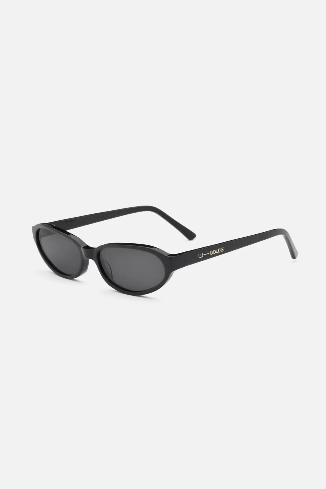 Sleek black acetate sunglasses shown from side angle, highlighting lightweight frame and ergonomic curve for all-day comfort.