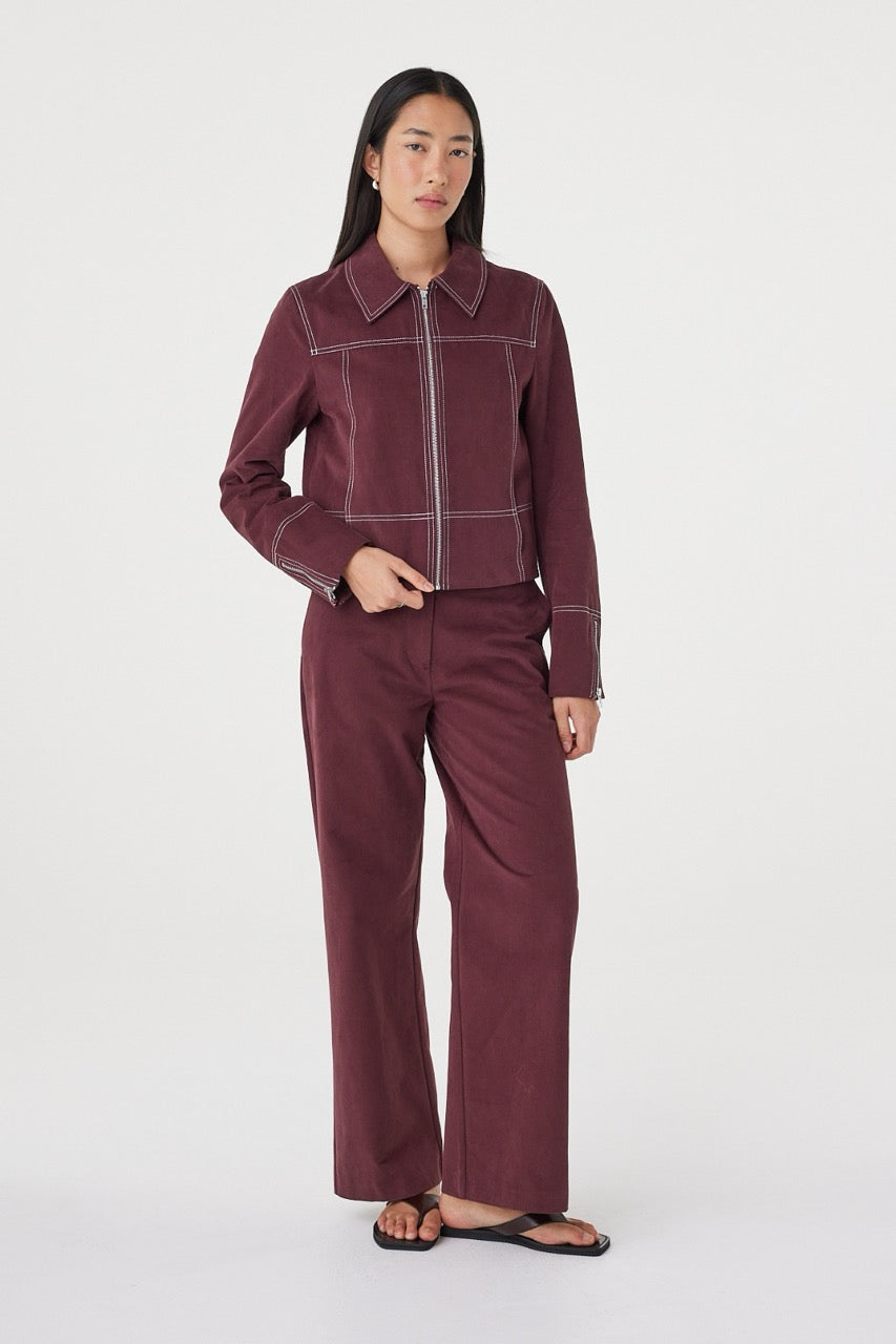 Full-length view of the Benny Jacket in Merlot worn as a coordinated set, showcasing the brushed cotton fabrication and relaxed silhouette.