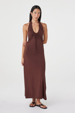 Full-length front view of the Suki Dress in Espresso showcasing the fluid maxi silhouette, halter neckline and side splits.