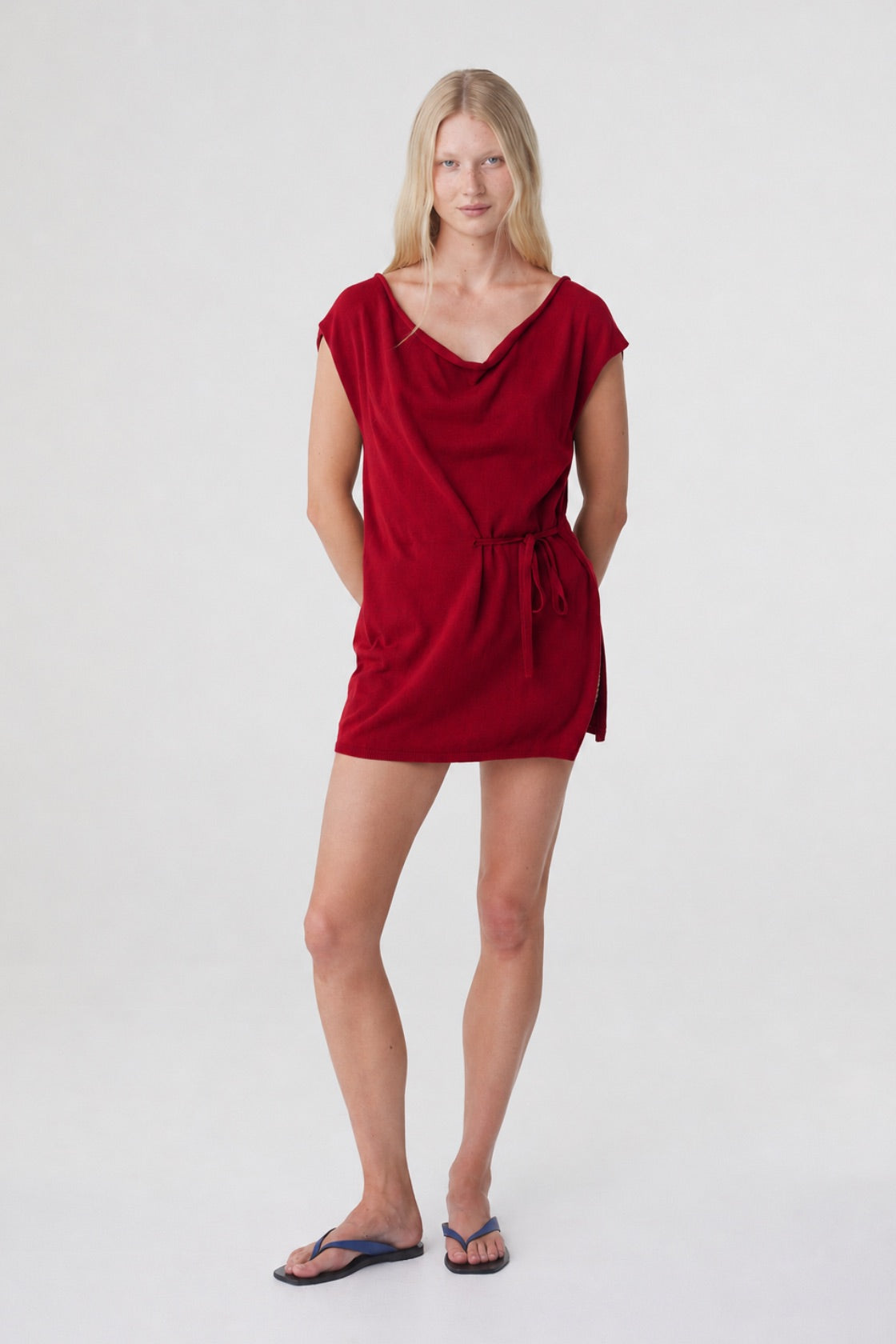 Nora Top in Chilli, full front view showing the longline silhouette, waist tie and low hip length.