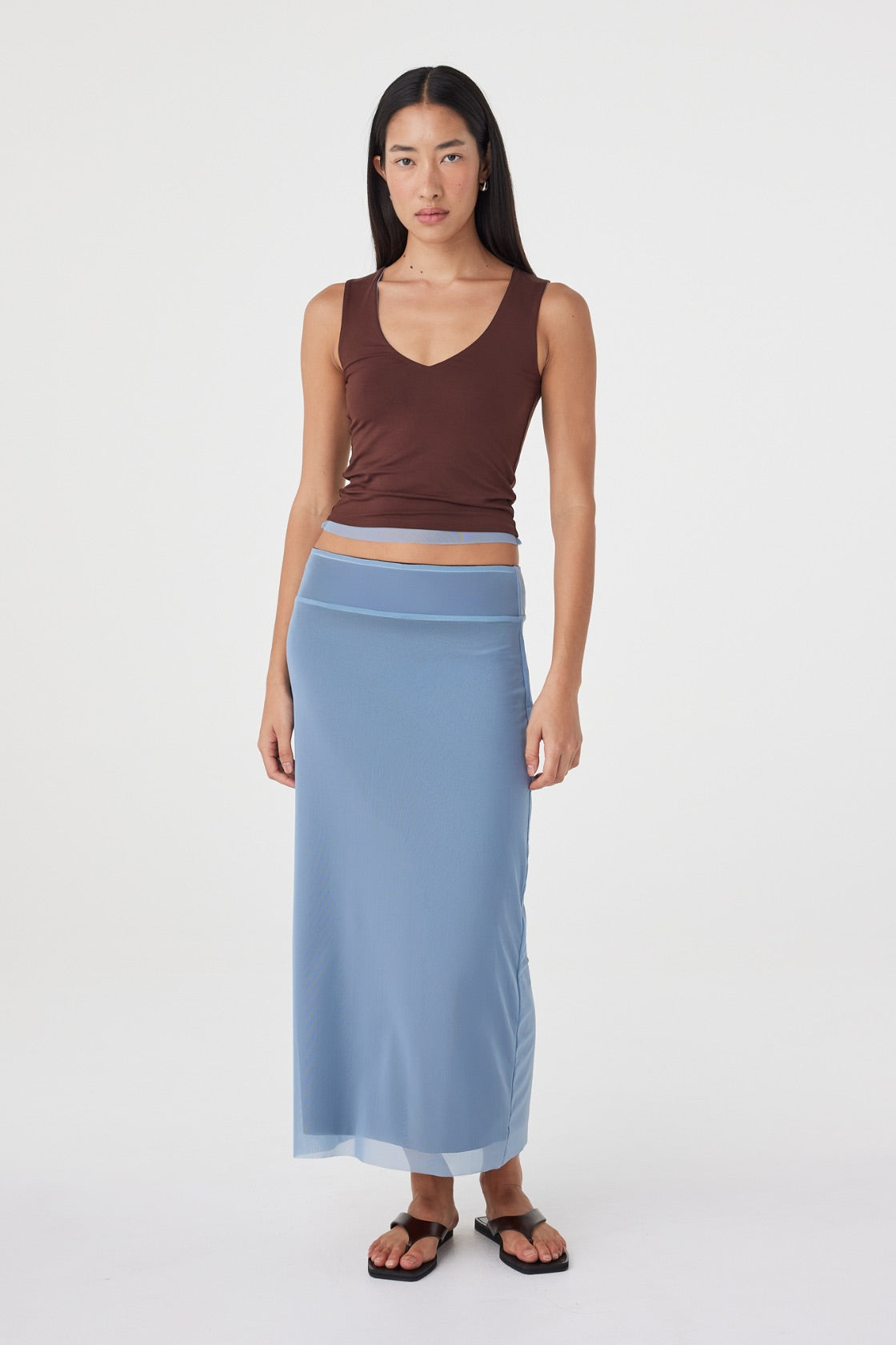 Full-length front view of the Eden Reversible Top in Pale Blue & Espresso showcasing the reversible espresso side, slim silhouette and coordinated styling with the matching pale blue skirt.