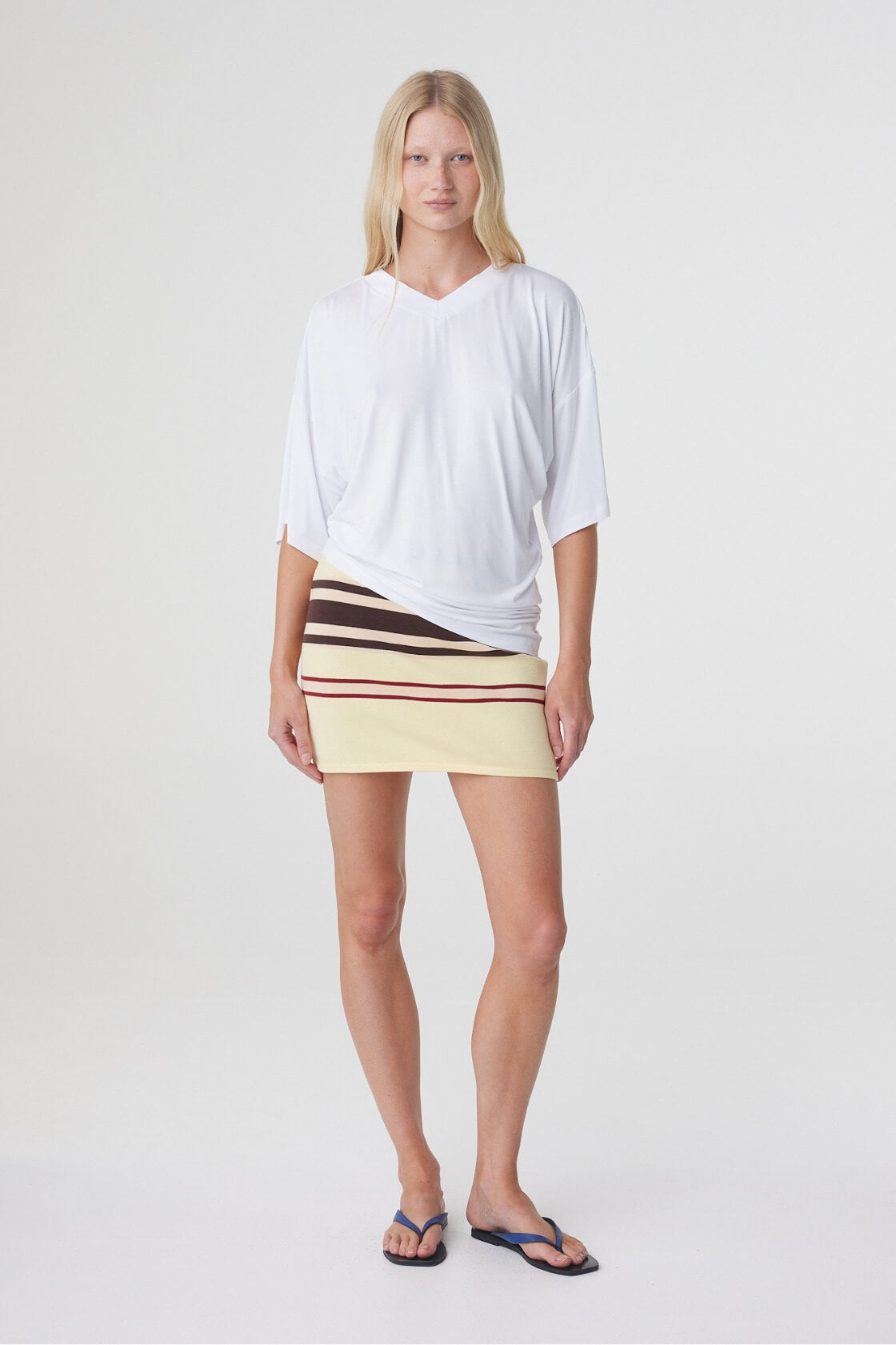 Mara Mini Skirt in Butter Espresso Stripe, full front view styled with an oversized white tee.