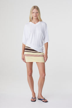 Mara Mini Skirt in Butter Espresso Stripe, full front view styled with an oversized white tee.