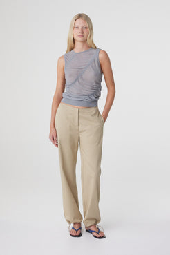 Sabi Pant in Taupe styled with a grey sleeveless top, full length front view with the hem softly gathered at the ankle.