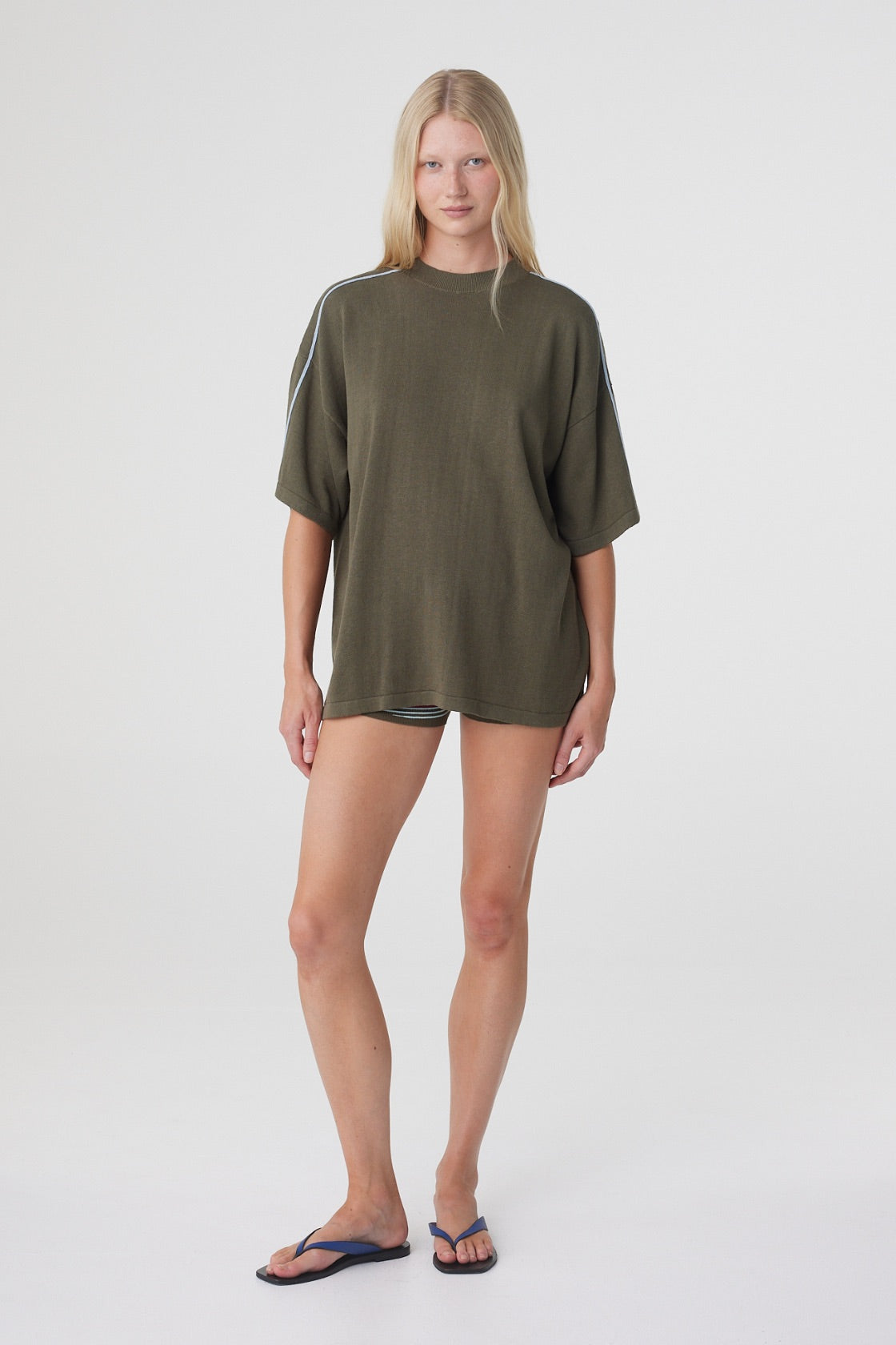 Pippa Oversized Tee in Smokey Olive and Dusk Blue, full length front view showing the dropped shoulders and relaxed oversized silhouette.

