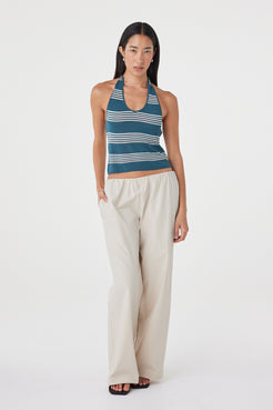 Full-length front view of the Annika Pant in Taupe styled with a striped tank and sandals, highlighting the relaxed wide leg shape.