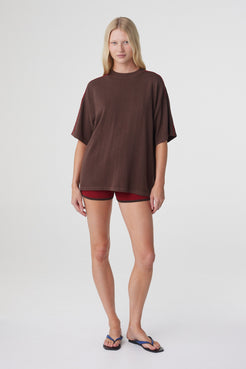 Pippa Oversized Tee in Espresso & Chilli, relaxed full length front pose styled with Chilli mini shorts.