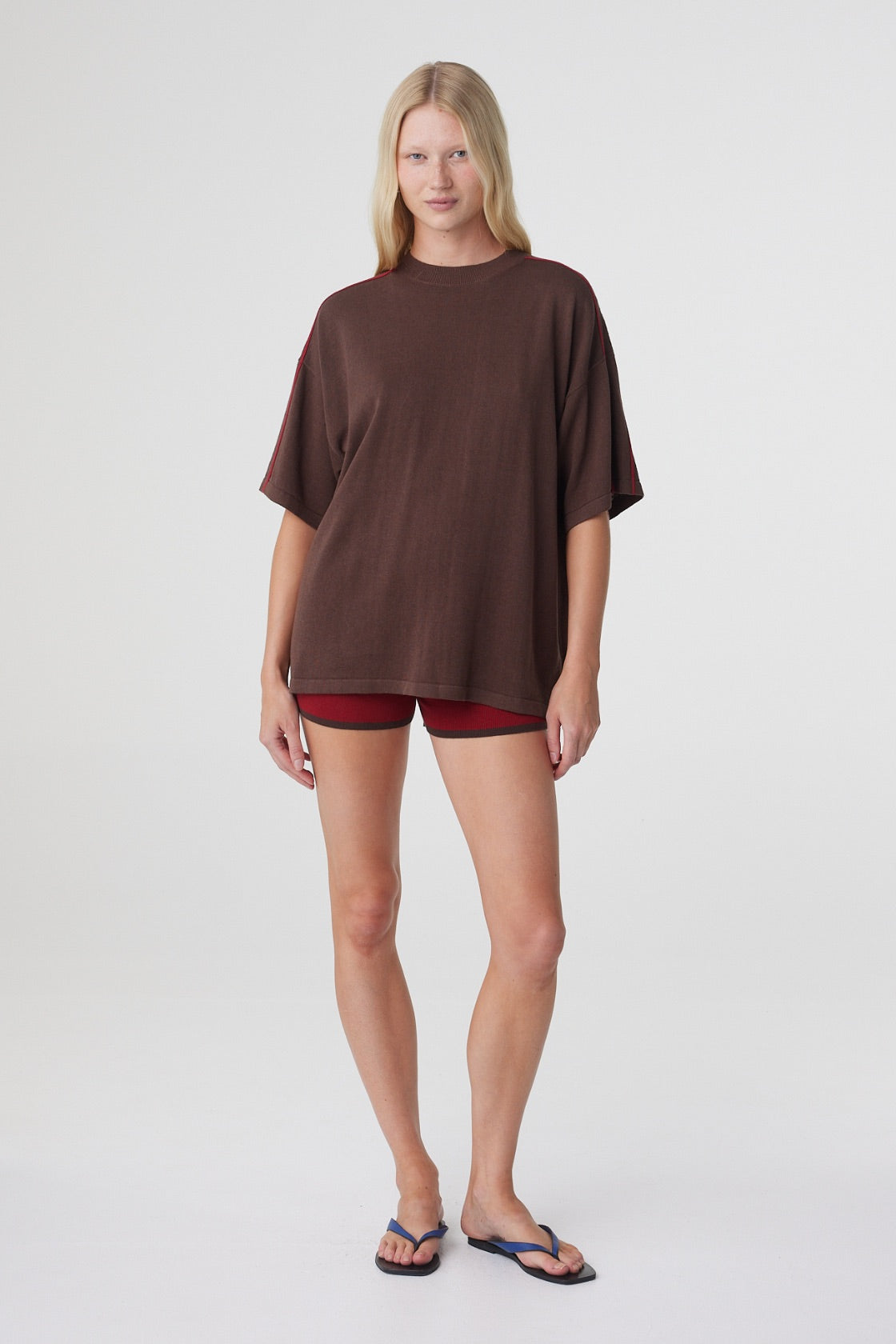 Pippa Oversized Tee in Espresso & Chilli, relaxed full length front pose styled with Chilli mini shorts.