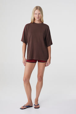 Pippa Oversized Tee in Espresso & Chilli, full front view styled with Chilli mini shorts, showing the oversized shape and wide short sleeves.