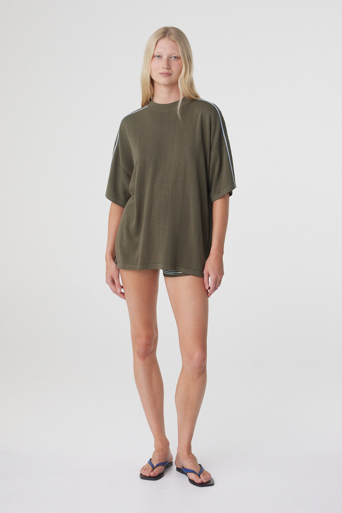 Pippa Oversized Tee in Smokey Olive and Dusk Blue, full length angled view showing the relaxed drape and oversized fit.