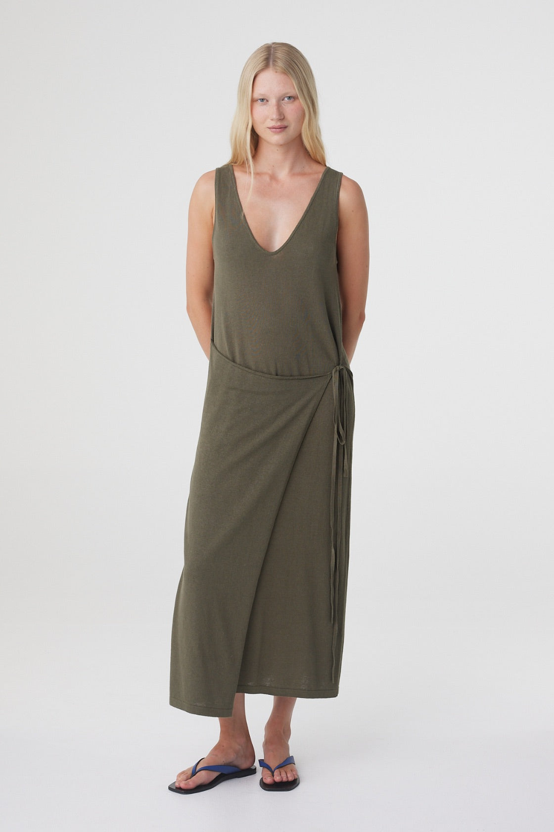 Sarina Wrap Maxi Dress in Smokey Olive, front view showing the relaxed sleeveless silhouette and maxi length.