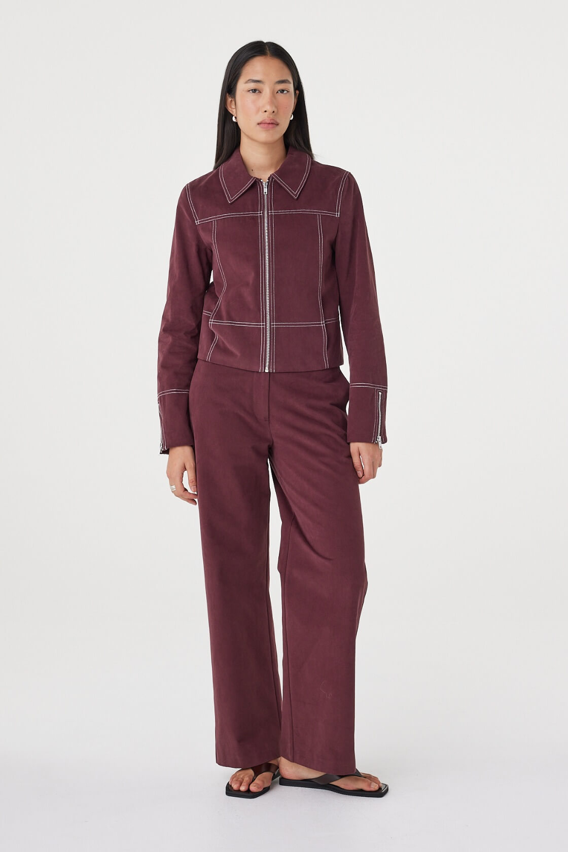 Full-length view of the Avery Pant in Merlot styled with the matching Benny Jacket for a coordinated set.