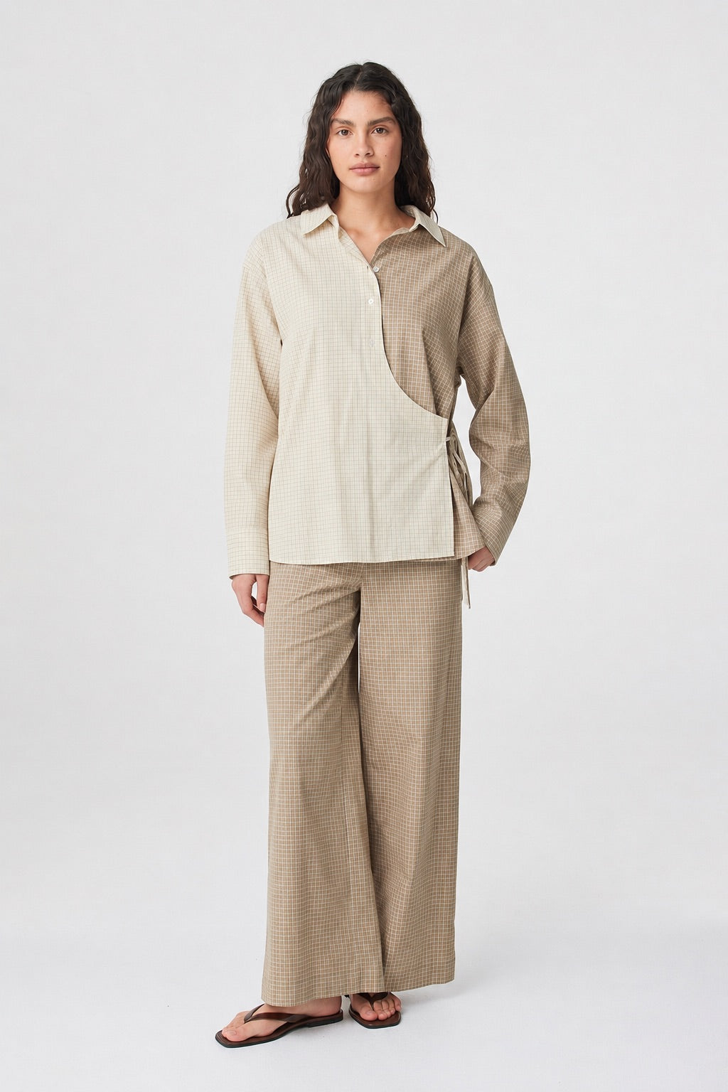 Autumn Wrap Shirt in Two Tone Check styled with coordinating check pants, full-length front view showing the oversized fit and curved hem.