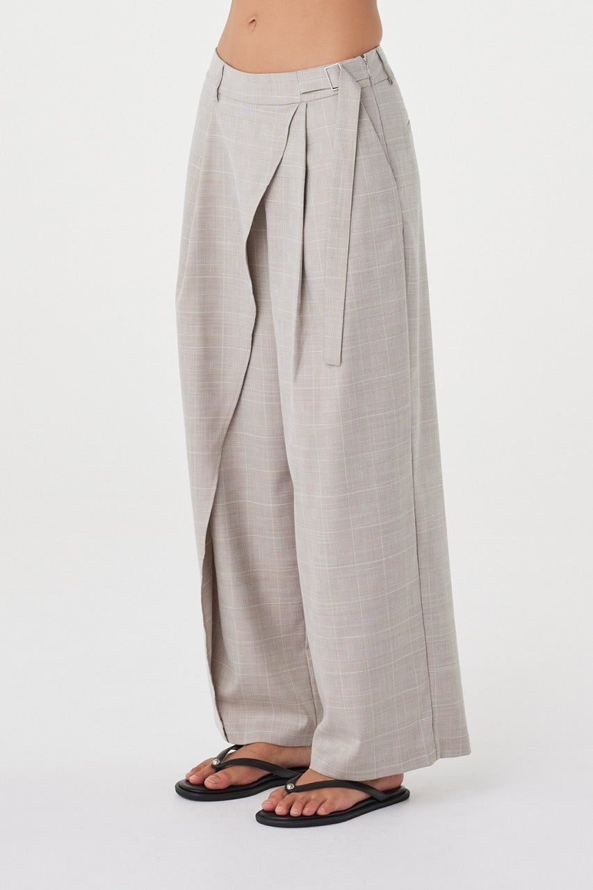Side view of the Calla Pant in Taupe Plaid showcasing the relaxed straight-leg silhouette and fluid drape.