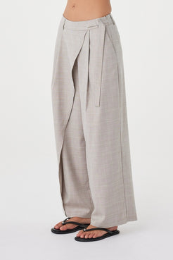 Side view of the Calla Pant in Taupe Plaid showcasing the relaxed straight-leg silhouette and fluid drape.