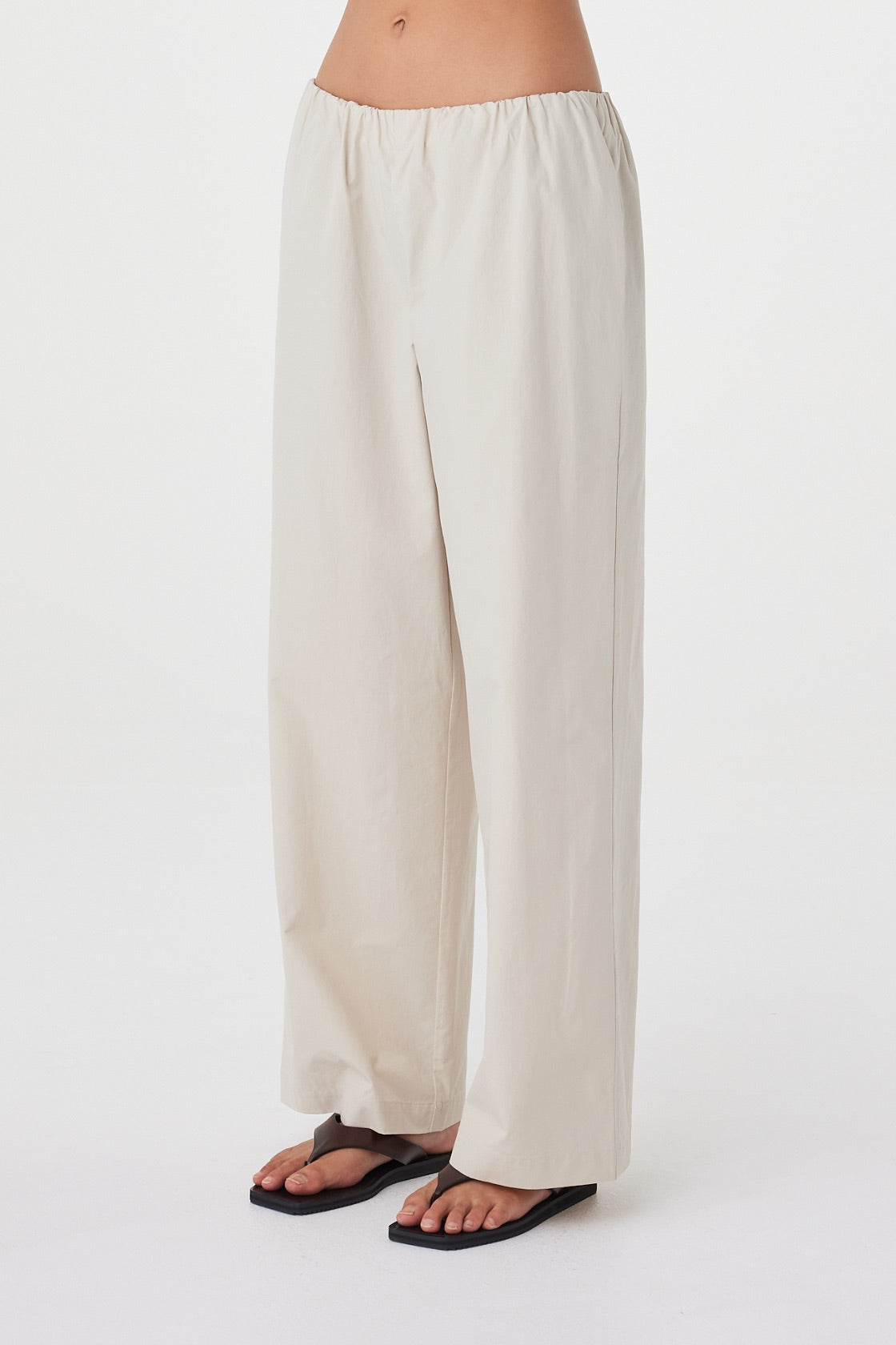 Close-up view of the Annika Pant in Taupe focusing on the wide leg silhouette and soft fabrication.
