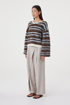 Side view of the Lucca Sweater in Espresso & Blue Stripe showing the easy oversized silhouette, dropped shoulder construction and fluffy knit finish.