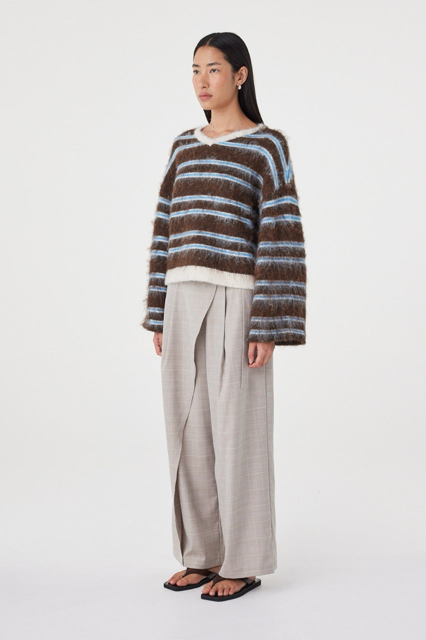 Side view of the Lucca Sweater in Espresso & Blue Stripe showing the easy oversized silhouette, dropped shoulder construction and fluffy knit finish.