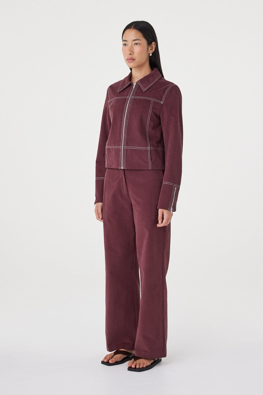 Side view of the Benny Jacket in Merlot showing the structured shape, lapel collar and brushed cotton texture.